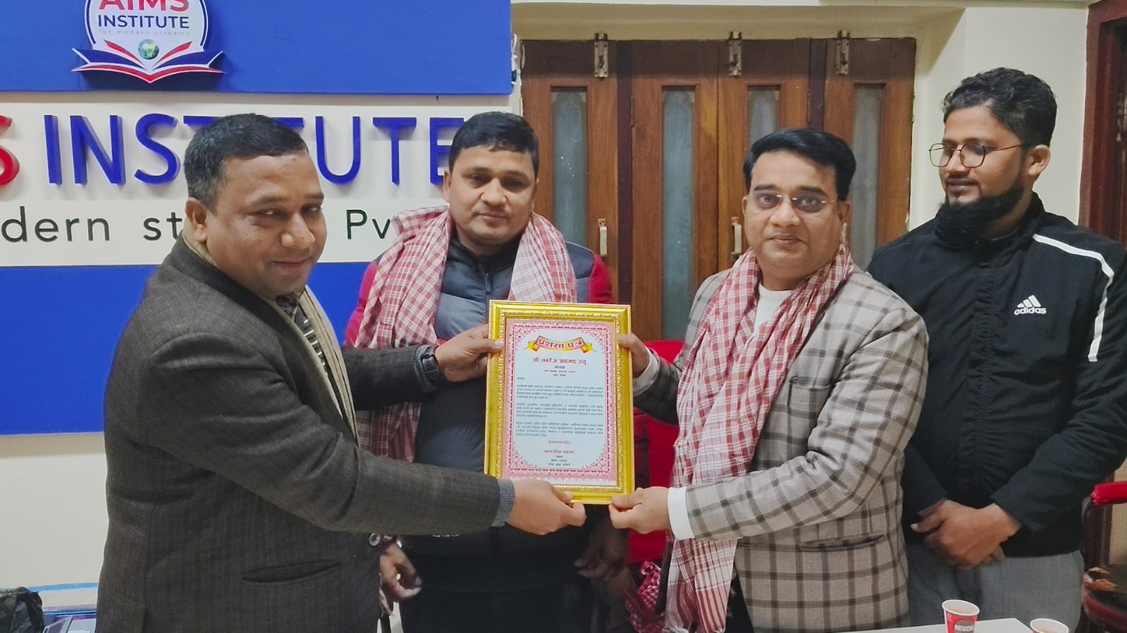 भूमि समस्या समाधान आयोगका अध्यक्षलाई AIMS Institute द्वारा सम्मान